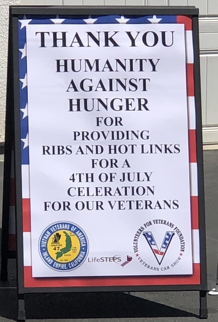 Community thank-you sign at a Humanity Against Hunger food drive
